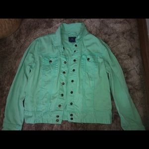 In good condition green jean jacket